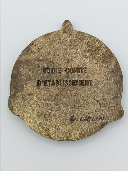 Médaille commémorative en bronze doré.
