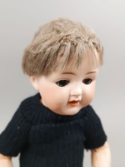 Poupée baigneur, tête en porcelaine, corps...