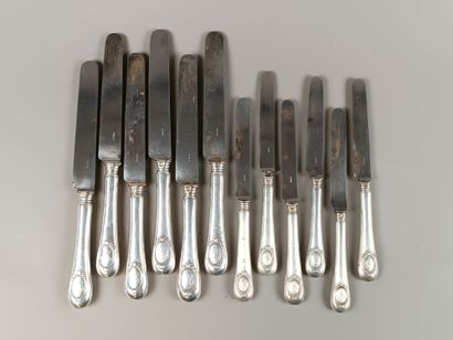 Double set of knives with forged silver handles...