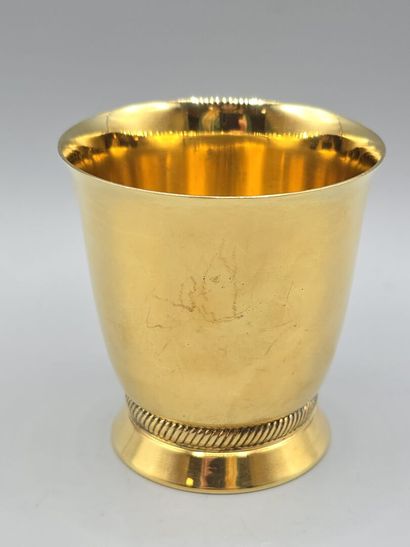 HENIN & Cie 
A vermeil flared tumbler on...