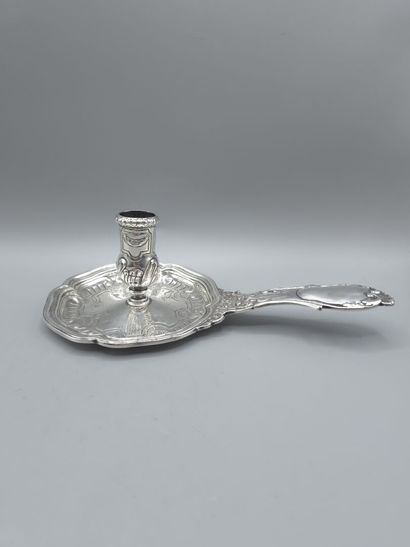 Bougeoir à main en argent.
Manche orné de...