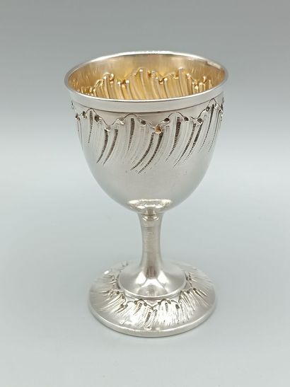 Louis XV-style silver egg cup.
Decorated...