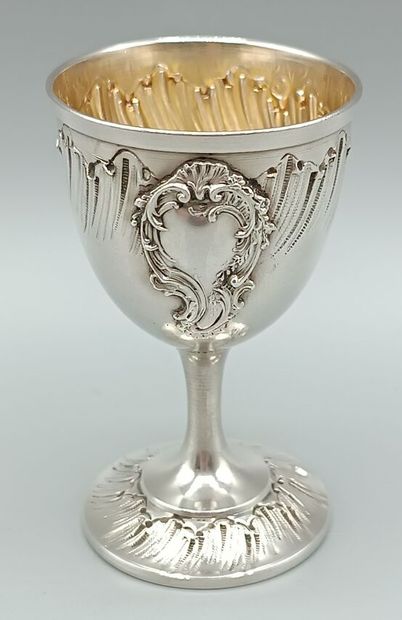 Louis XV-style silver egg cup.
Decorated...