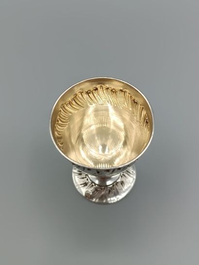 Louis XV-style silver egg cup.
Decorated...