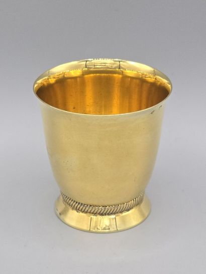 HENIN & Cie 
A vermeil flared tumbler on...