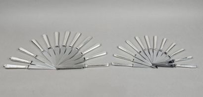HENIN & Cie 
Double set of knives with silver...