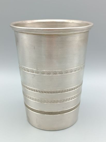 Tall and wide silver tumbler.
The body is...