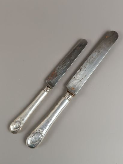 Double set of knives with forged silver handles...