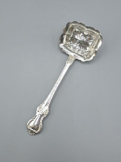 Rectangular silver sugar spoon with atypical...