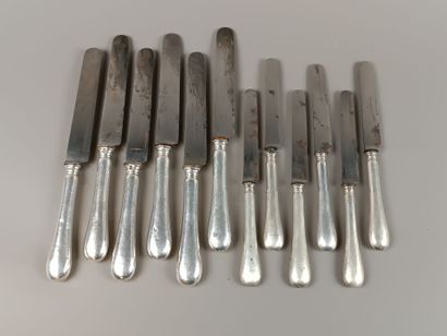 Double set of knives with forged silver handles...