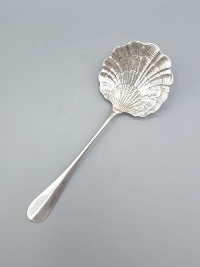 Silver strawberry scoop with scallop-shaped...