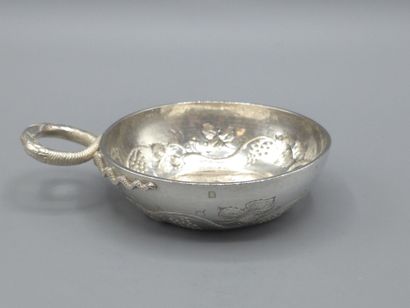 Silver wine taster with facing snake grip....