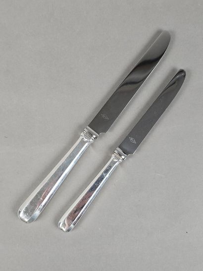 HENIN & Cie 
Double set of knives with silver...