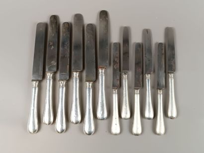 Double set of knives with forged silver handles...