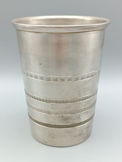 Tall and wide silver tumbler.
The body is...