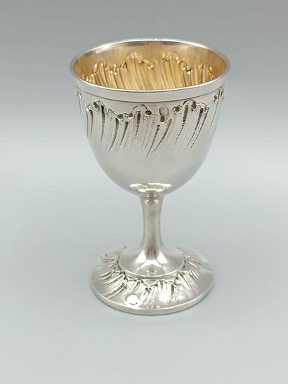 Louis XV-style silver egg cup.
Decorated...
