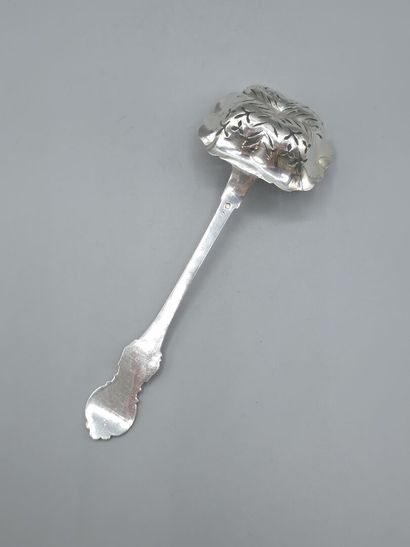 Rectangular silver sugar spoon with atypical...
