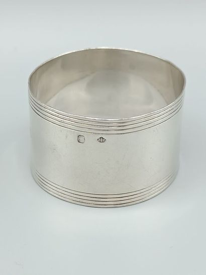 PUIFORCAT
Silver napkin ring with central...