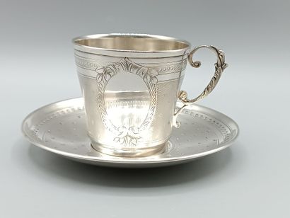 COIGNET 
Silver service with cup and saucer....