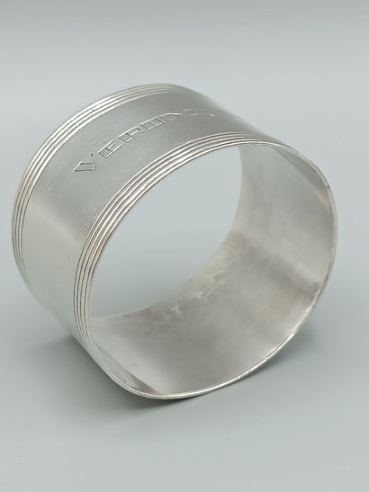 PUIFORCAT
Silver napkin ring with central...
