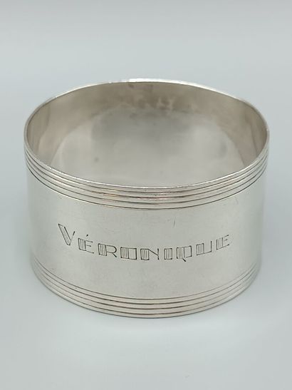 PUIFORCAT
Silver napkin ring with central...
