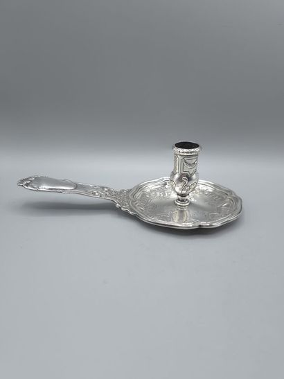 Bougeoir à main en argent.
Manche orné de...