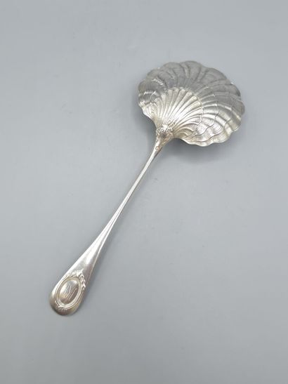 Silver strawberry scoop with scallop-shaped...