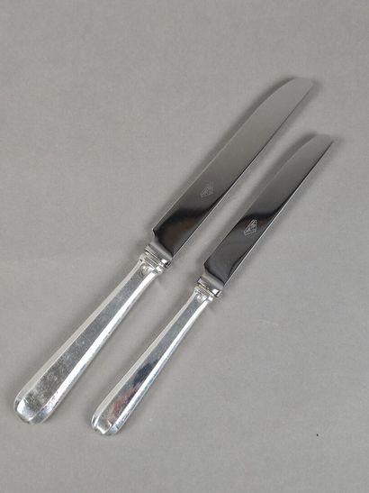 HENIN & Cie 
Double set of knives with silver...