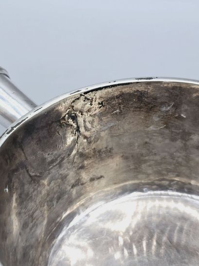 Silver skillet with pouring spout
Turned...