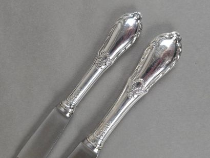 Double set of knives with forged silver handles...