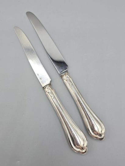 PUIFORCAT-MELLERIO 
Double set of knives...