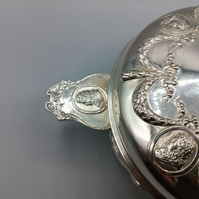 Circular silver vegetable dish in the Louis...