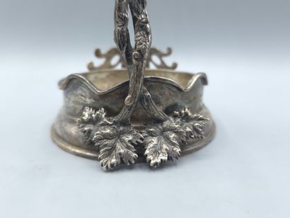 Bottle holder in cast and chased silver....