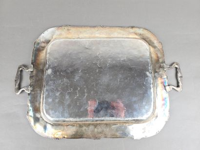 A silver tray with a curved shape.
The wing...