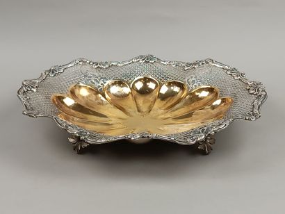Oval-shaped silver basket with contours....
