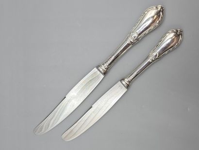 Double set of knives with forged silver handles...