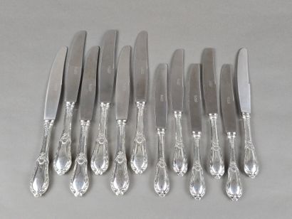 Double set of knives with forged silver handles...