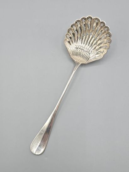 Silver spatula sugar spoon with a medallion...