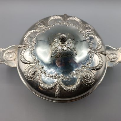 Circular silver vegetable dish in the Louis...
