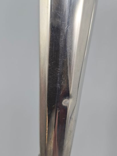 Pair of silver candlesticks.
The upper part...