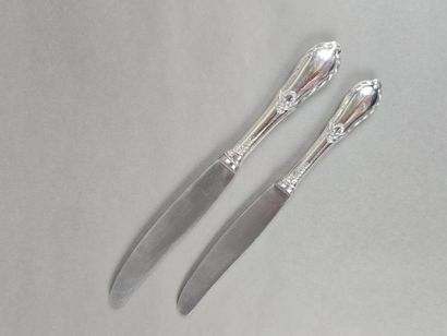 Double set of knives with forged silver handles...