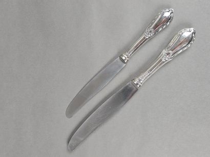Double set of knives with forged silver handles...