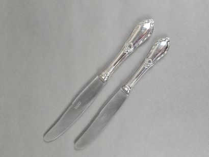 Double set of knives with forged silver handles...