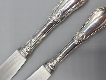 Double set of knives with forged silver handles...
