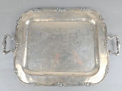 A silver tray with a curved shape.
The wing...