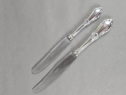Double set of knives with forged silver handles...