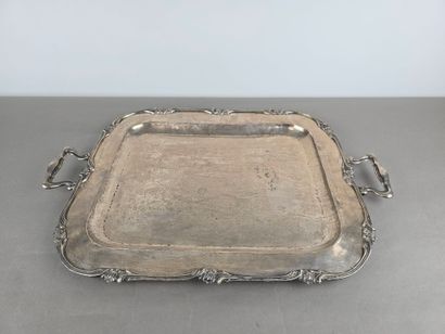 A silver tray with a curved shape.
The wing...
