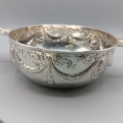 Circular silver vegetable dish in the Louis...