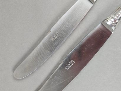Double set of knives with forged silver handles...