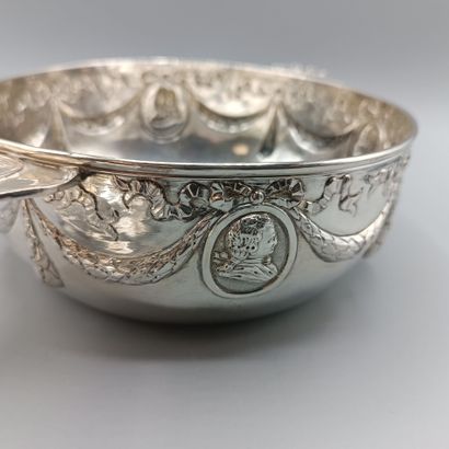 Circular silver vegetable dish in the Louis...